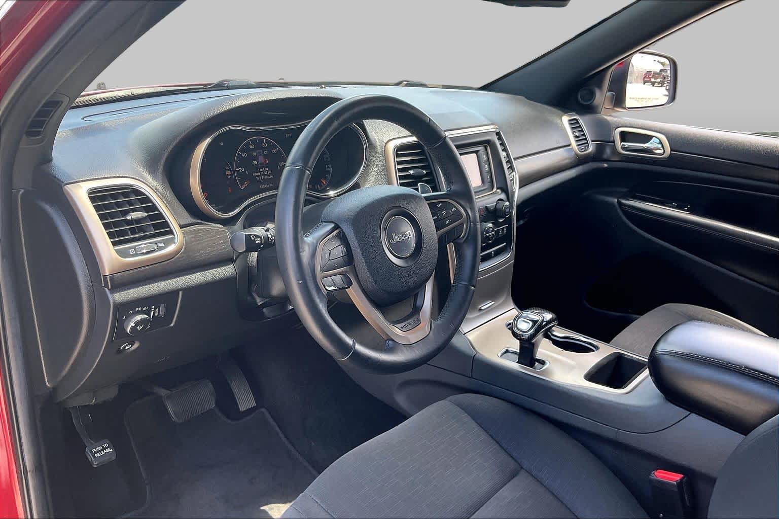 2014 Jeep Grand Cherokee Laredo Deep Cherry Red Crystal Pearlcoat at Sterling McCall Nissan