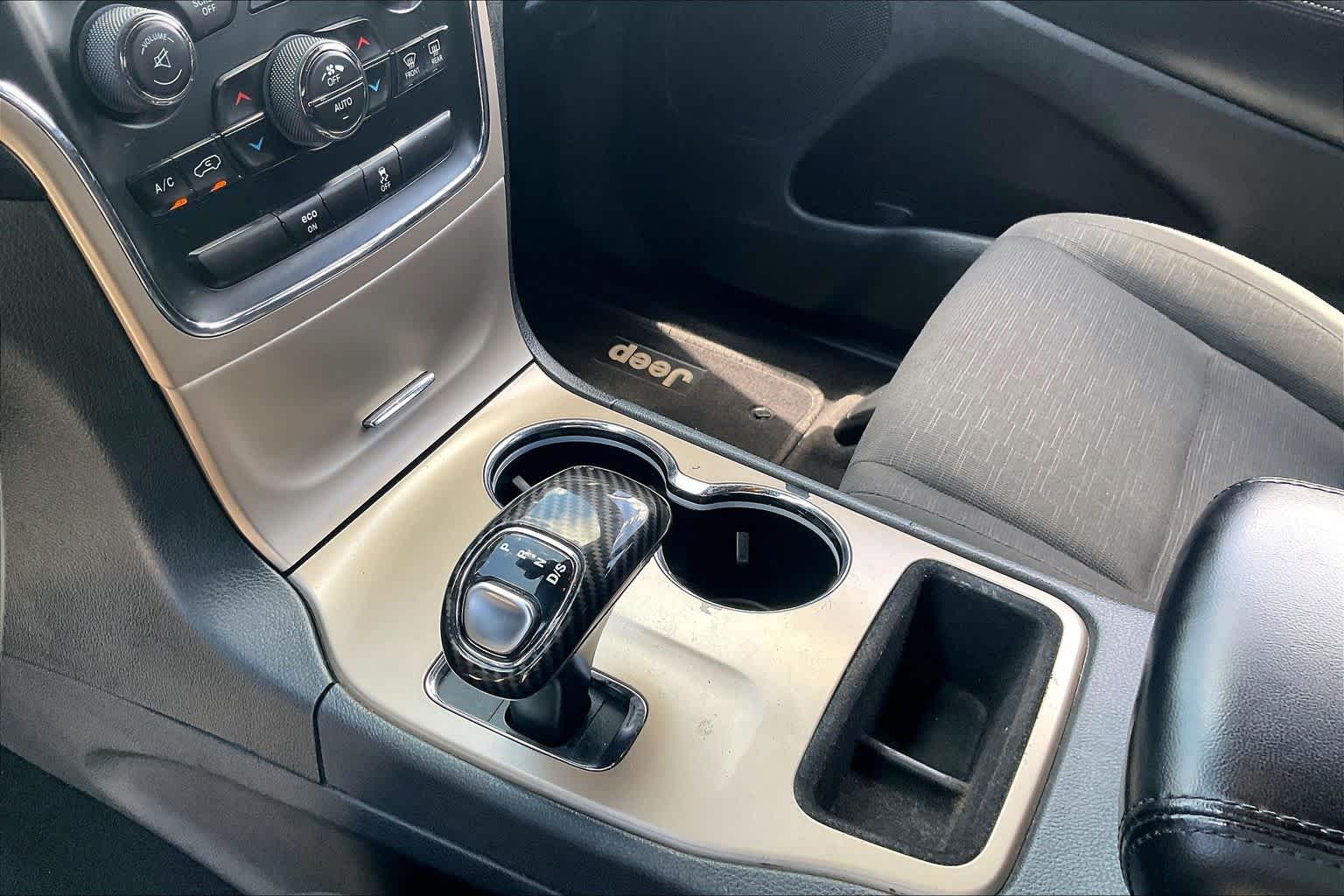 2014 Jeep Grand Cherokee Laredo Deep Cherry Red Crystal Pearlcoat at Sterling McCall Nissan