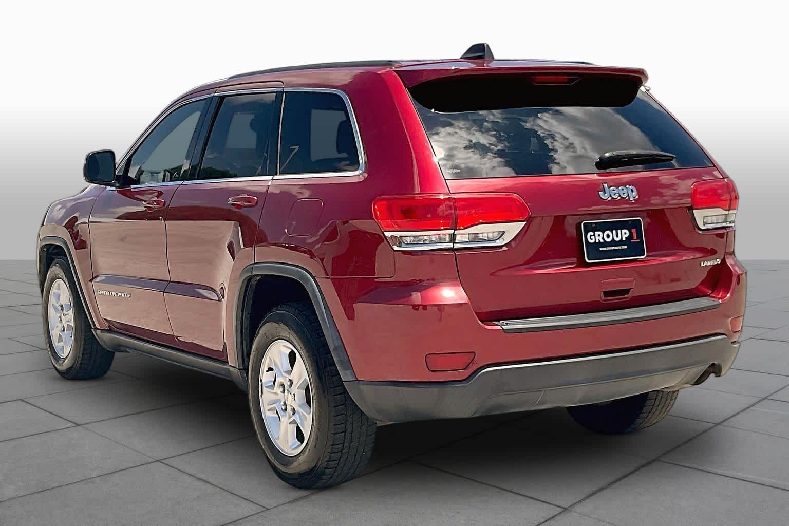 2014 Jeep Grand Cherokee Laredo Deep Cherry Red Crystal Pearlcoat at Sterling McCall Nissan