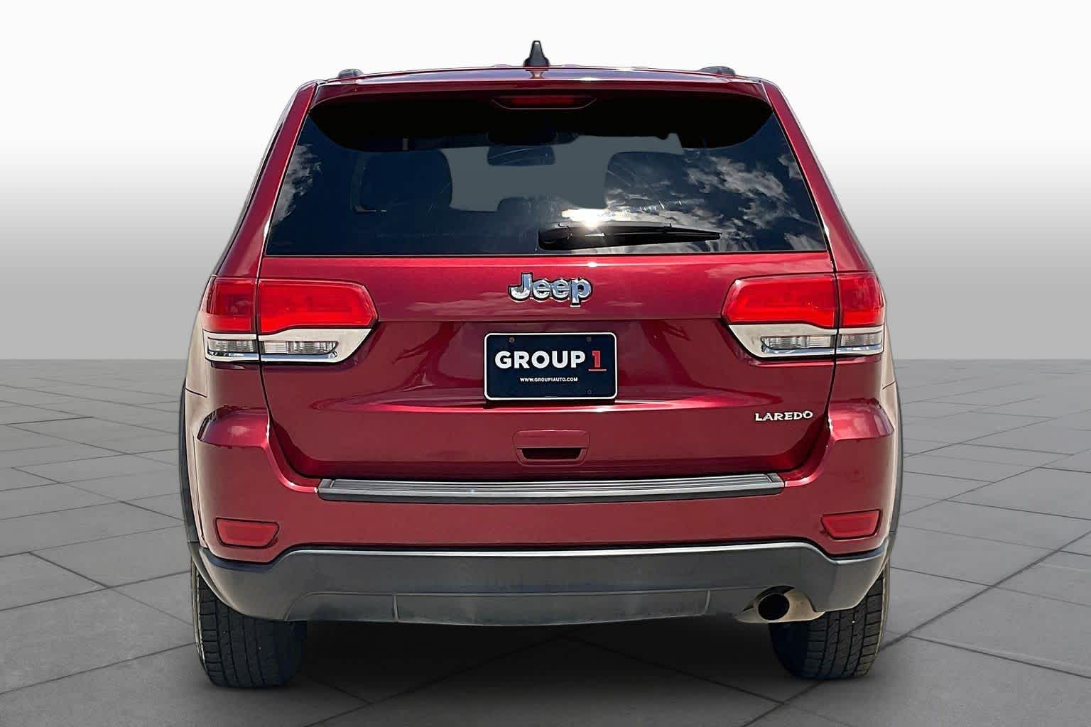 2014 Jeep Grand Cherokee Laredo Deep Cherry Red Crystal Pearlcoat at Sterling McCall Nissan