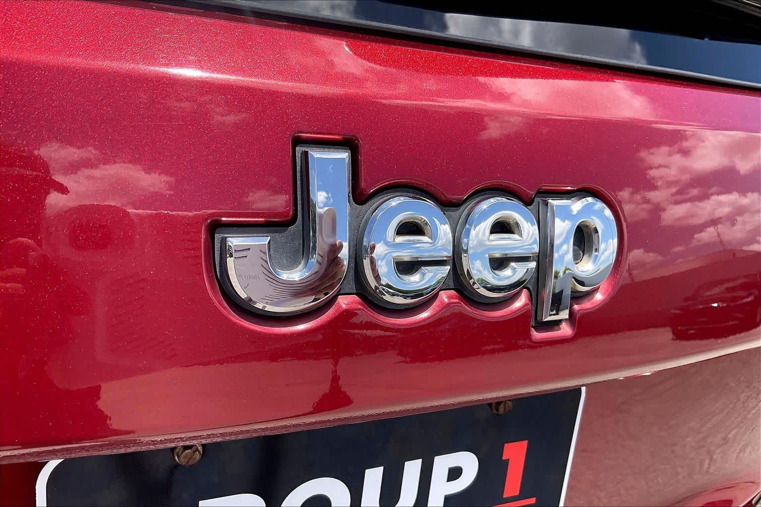 2014 Jeep Grand Cherokee Laredo Deep Cherry Red Crystal Pearlcoat at Sterling McCall Nissan