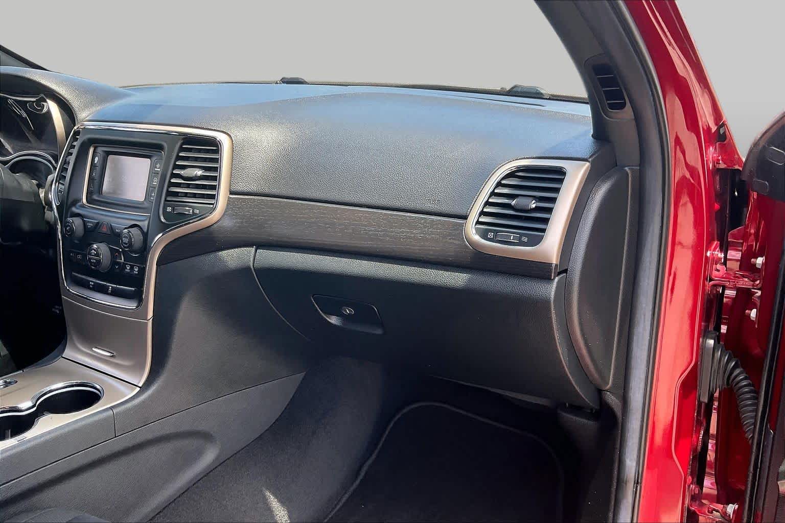 2014 Jeep Grand Cherokee Laredo Deep Cherry Red Crystal Pearlcoat at Sterling McCall Nissan