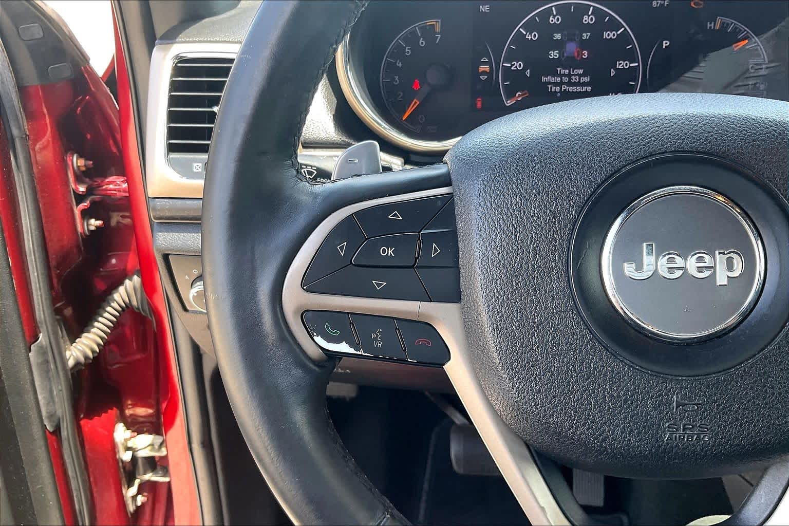2014 Jeep Grand Cherokee Laredo Deep Cherry Red Crystal Pearlcoat at Sterling McCall Nissan