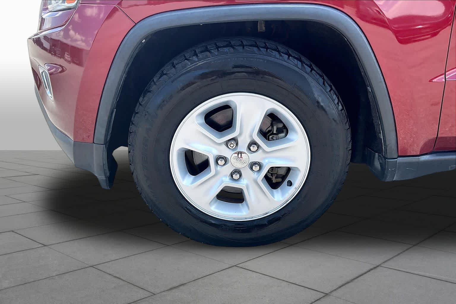 2014 Jeep Grand Cherokee Laredo Deep Cherry Red Crystal Pearlcoat at Sterling McCall Nissan