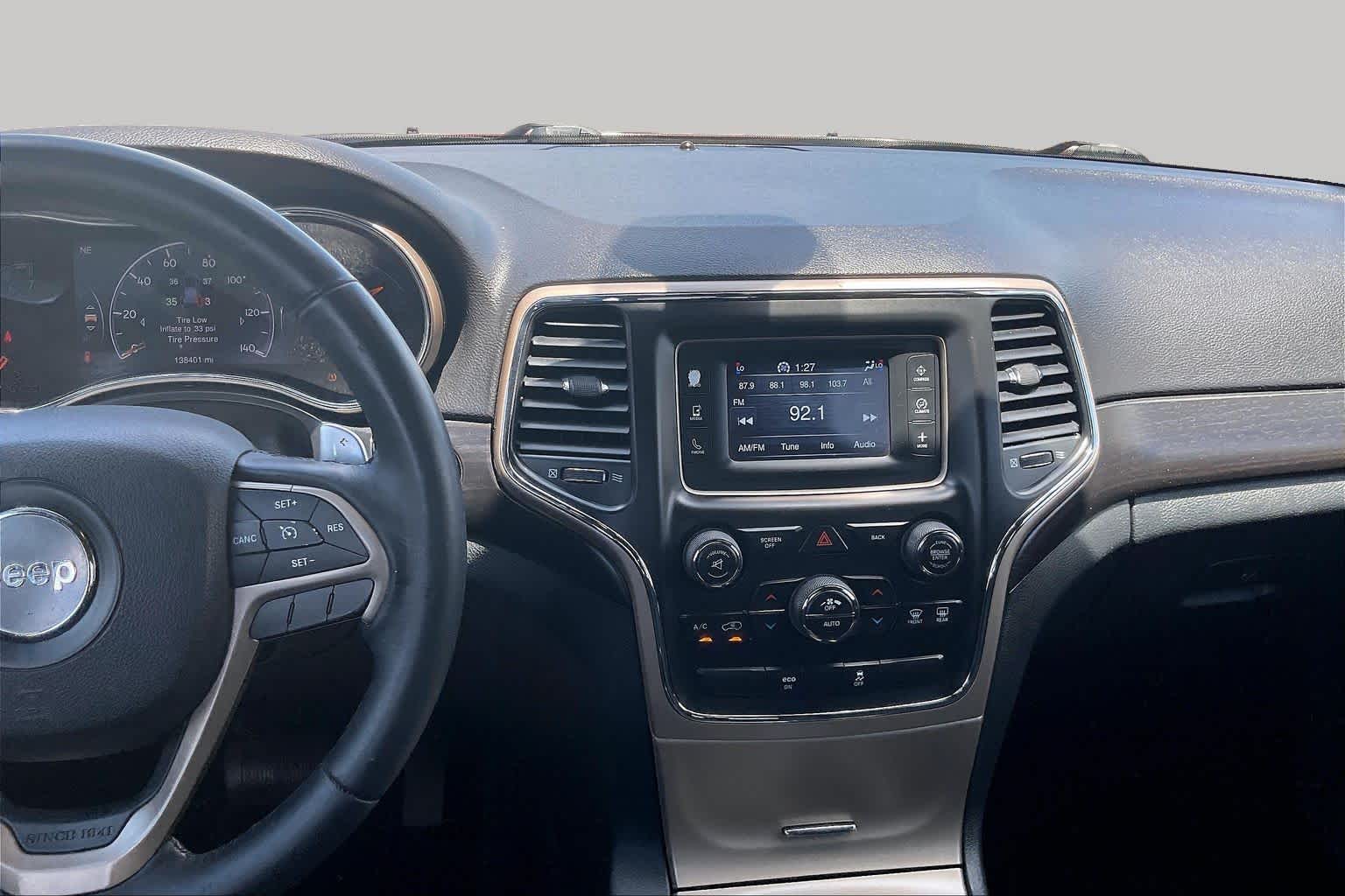 2014 Jeep Grand Cherokee Laredo Deep Cherry Red Crystal Pearlcoat at Sterling McCall Nissan