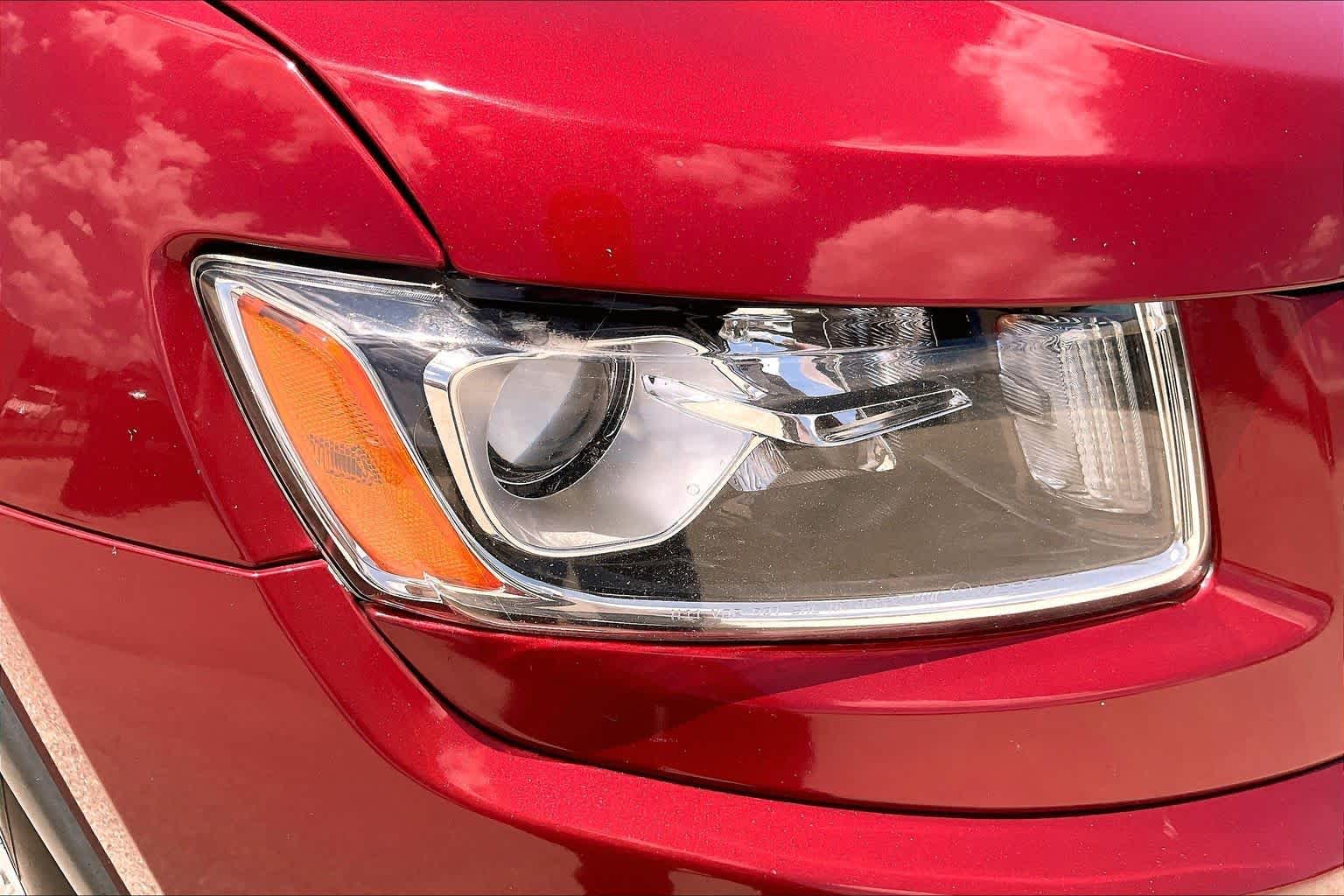 2014 Jeep Grand Cherokee Laredo Deep Cherry Red Crystal Pearlcoat at Sterling McCall Nissan