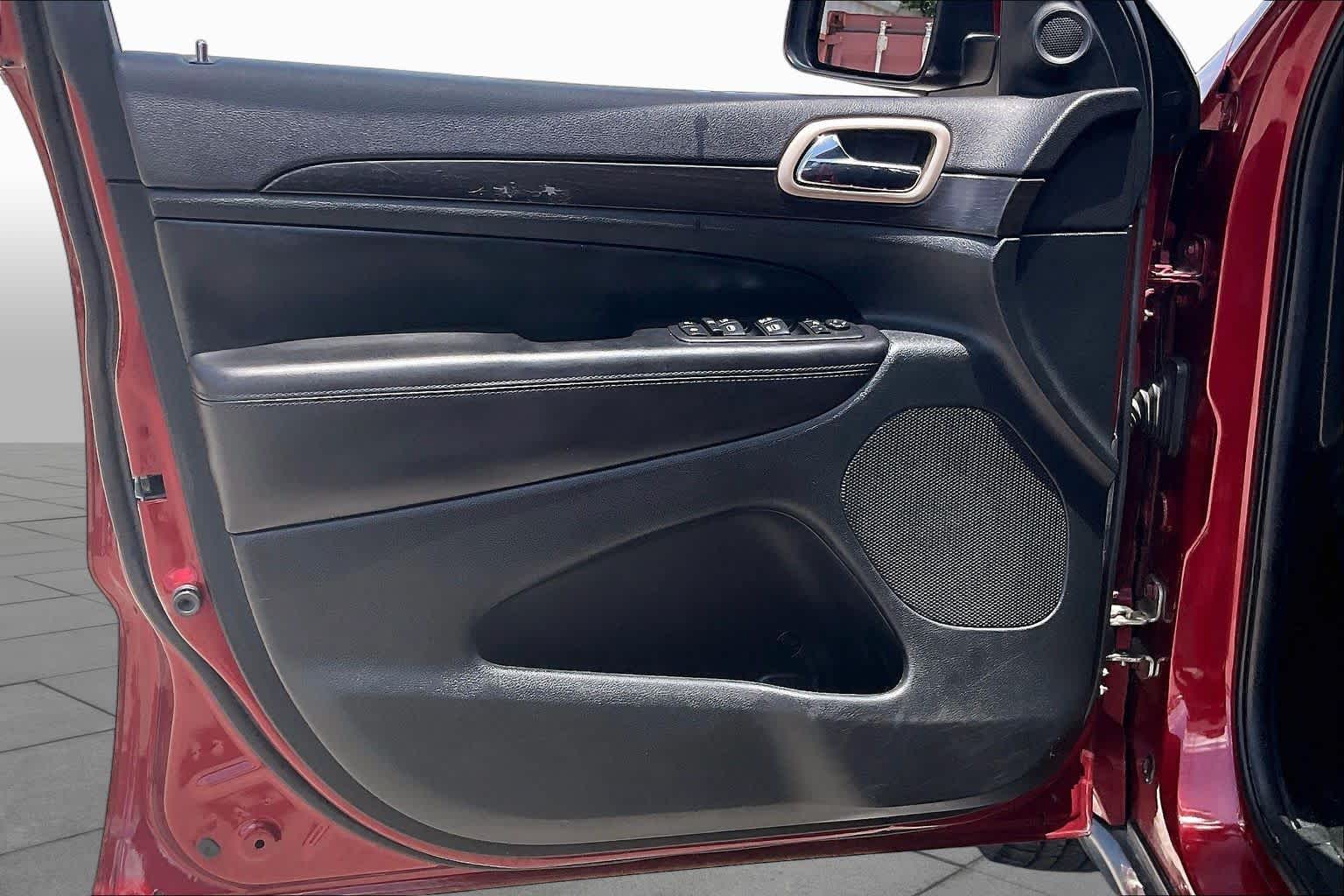 2014 Jeep Grand Cherokee Laredo Deep Cherry Red Crystal Pearlcoat at Sterling McCall Nissan
