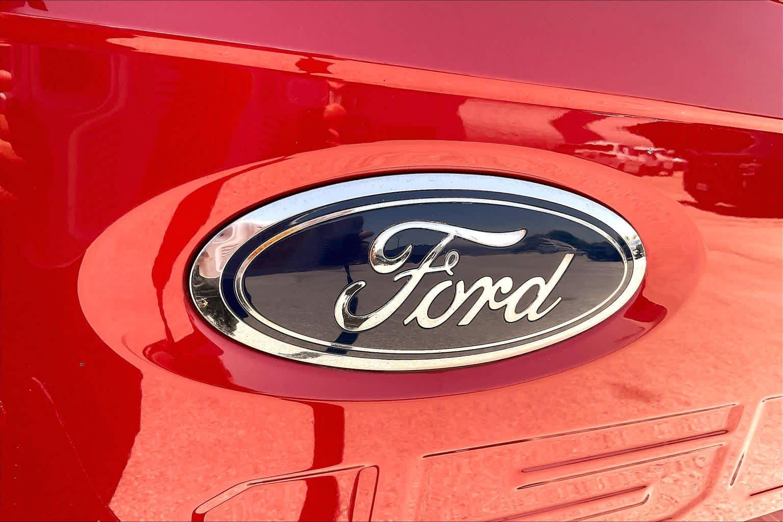 2023 Ford F-150 LARIAT Rapid Red Metallic Tinted Clearcoat at Tomball Ford
