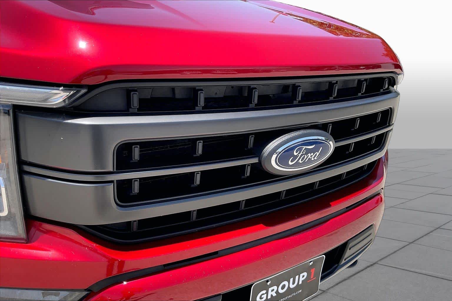 2023 Ford F-150 LARIAT Rapid Red Metallic Tinted Clearcoat at Tomball Ford