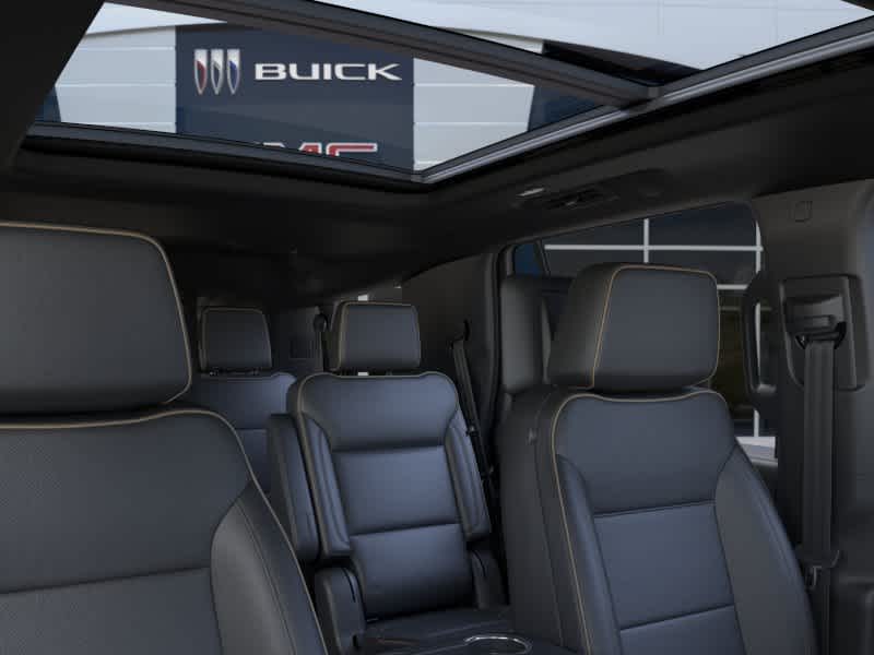 2026 GMC Yukon Elevation Volcanic Red Tintcoat at Texan GMC Buick