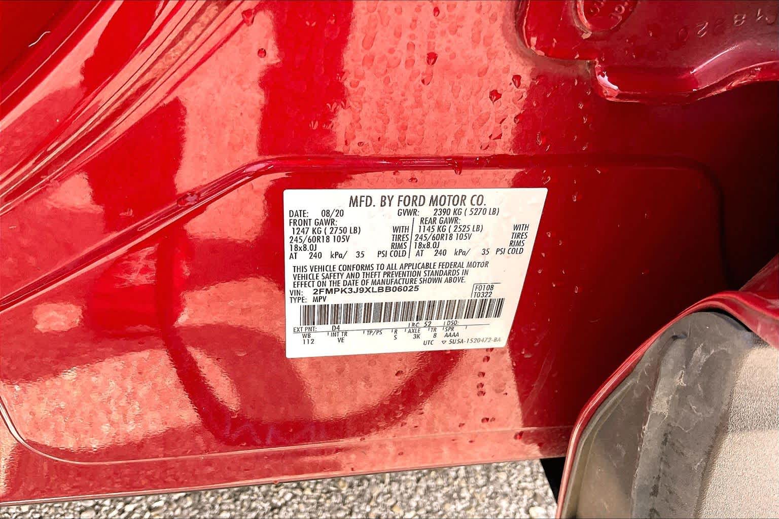 2020 Ford Edge SEL Rapid Red Metallic Tinted Clearcoat at Tomball Ford