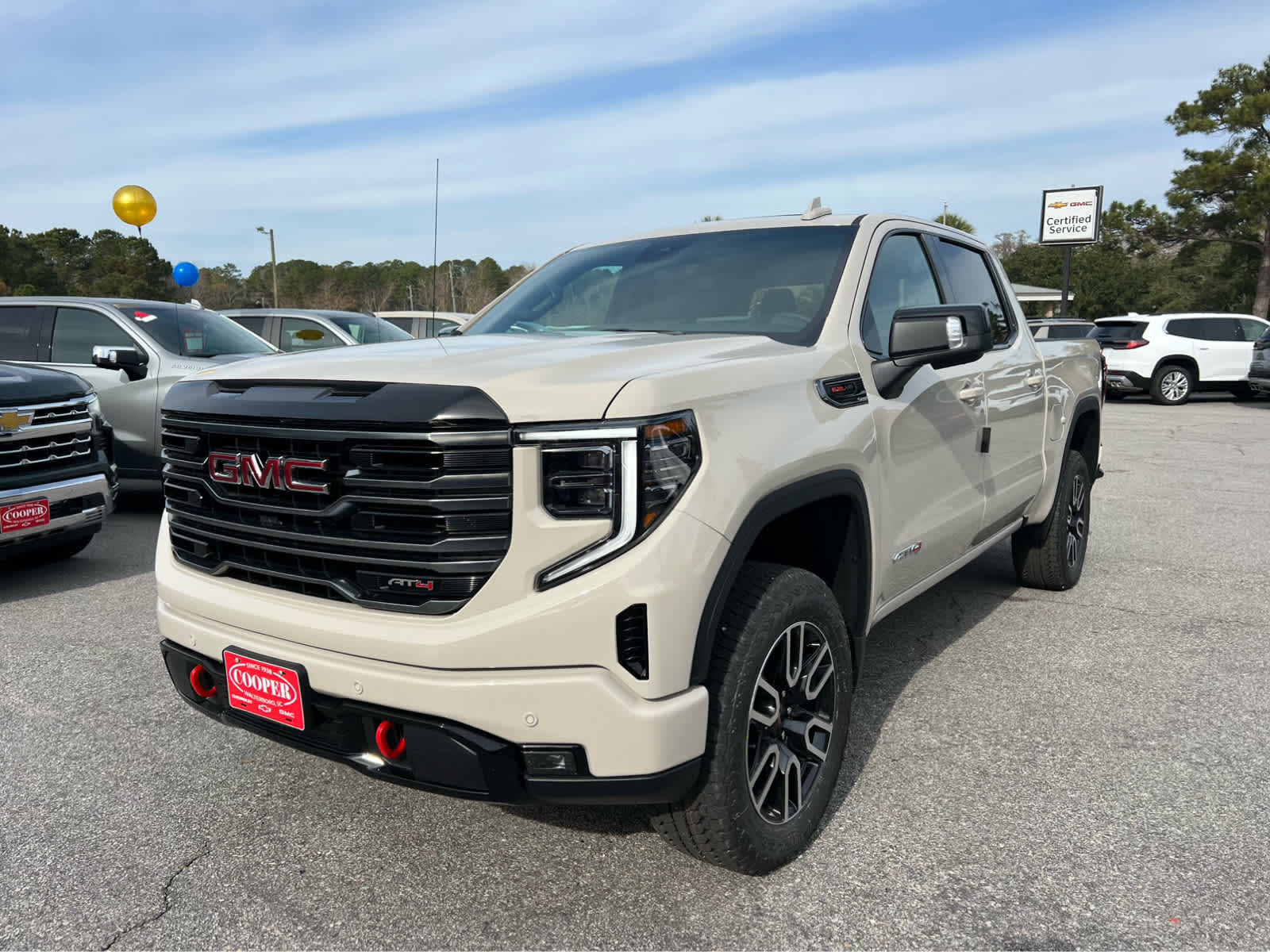 2026 GMC Sierra 1500 AT4 COASTAL DUNE at Cooper Chevrolet GMC
