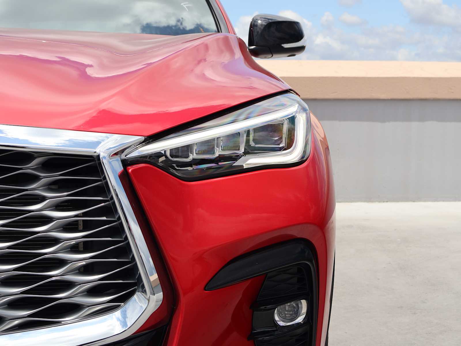Certified Used 2025 Dynamic Sunstone Red INFINITI ESSENTIAL image 10