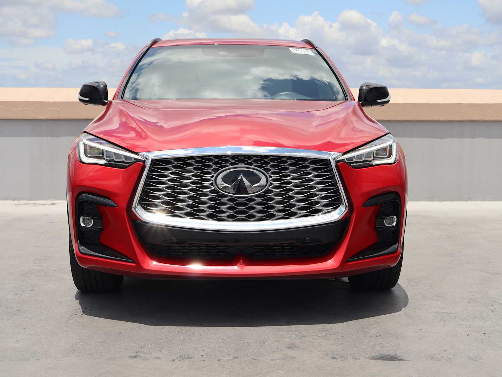Certified Used 2025 Dynamic Sunstone Red INFINITI ESSENTIAL image 2