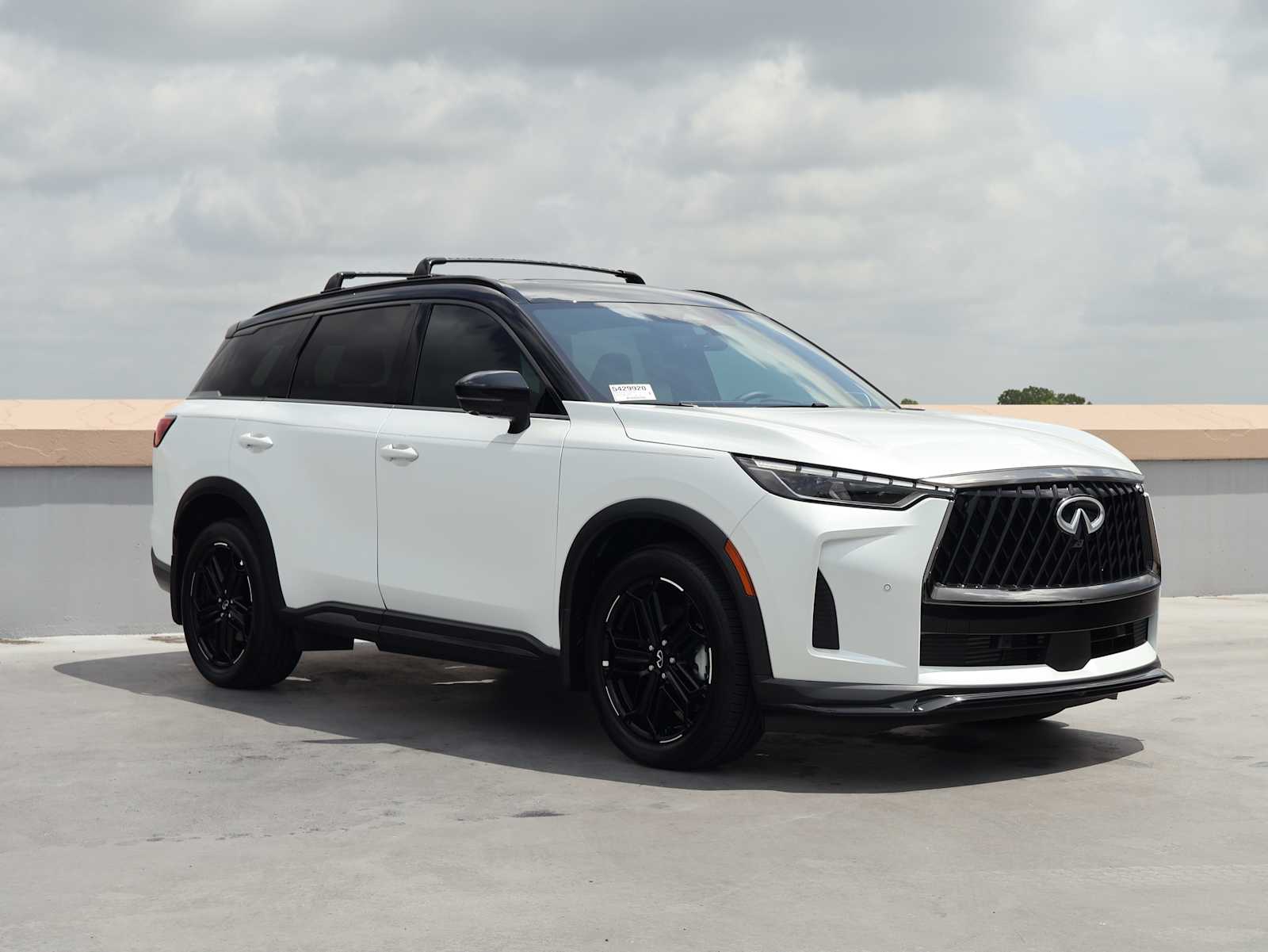 Certified Used 2026 Radiant White/Black Obsidian INFINITI SPORT image 4