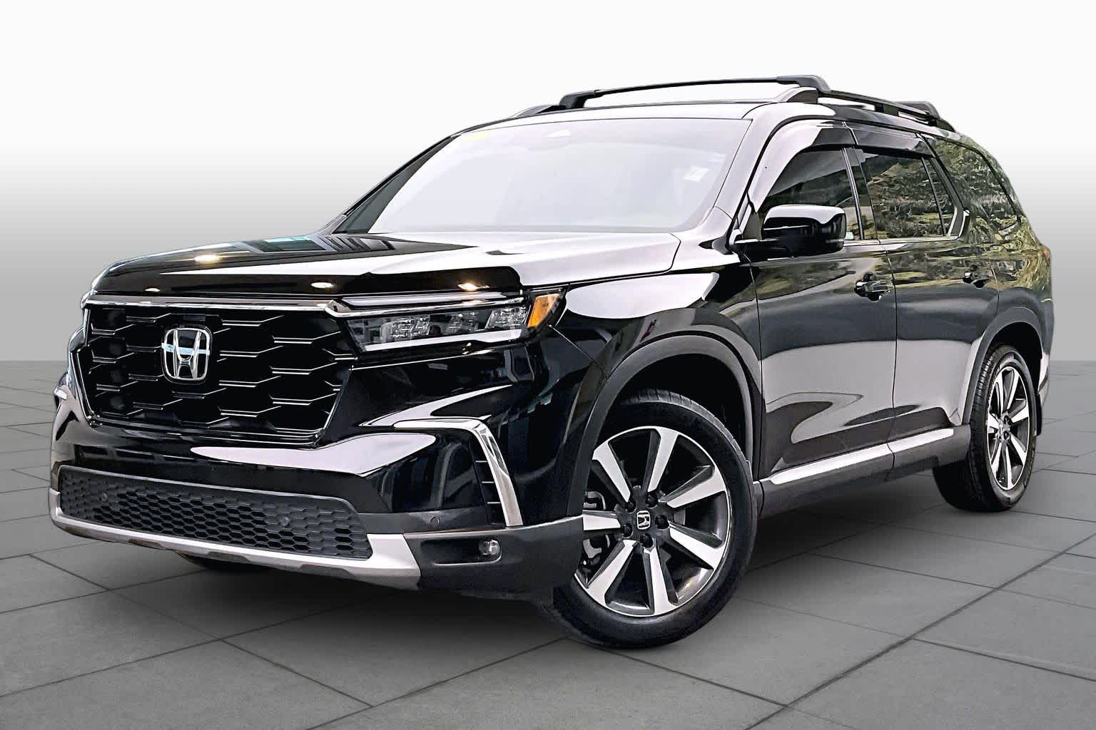 View vehicle photo 2