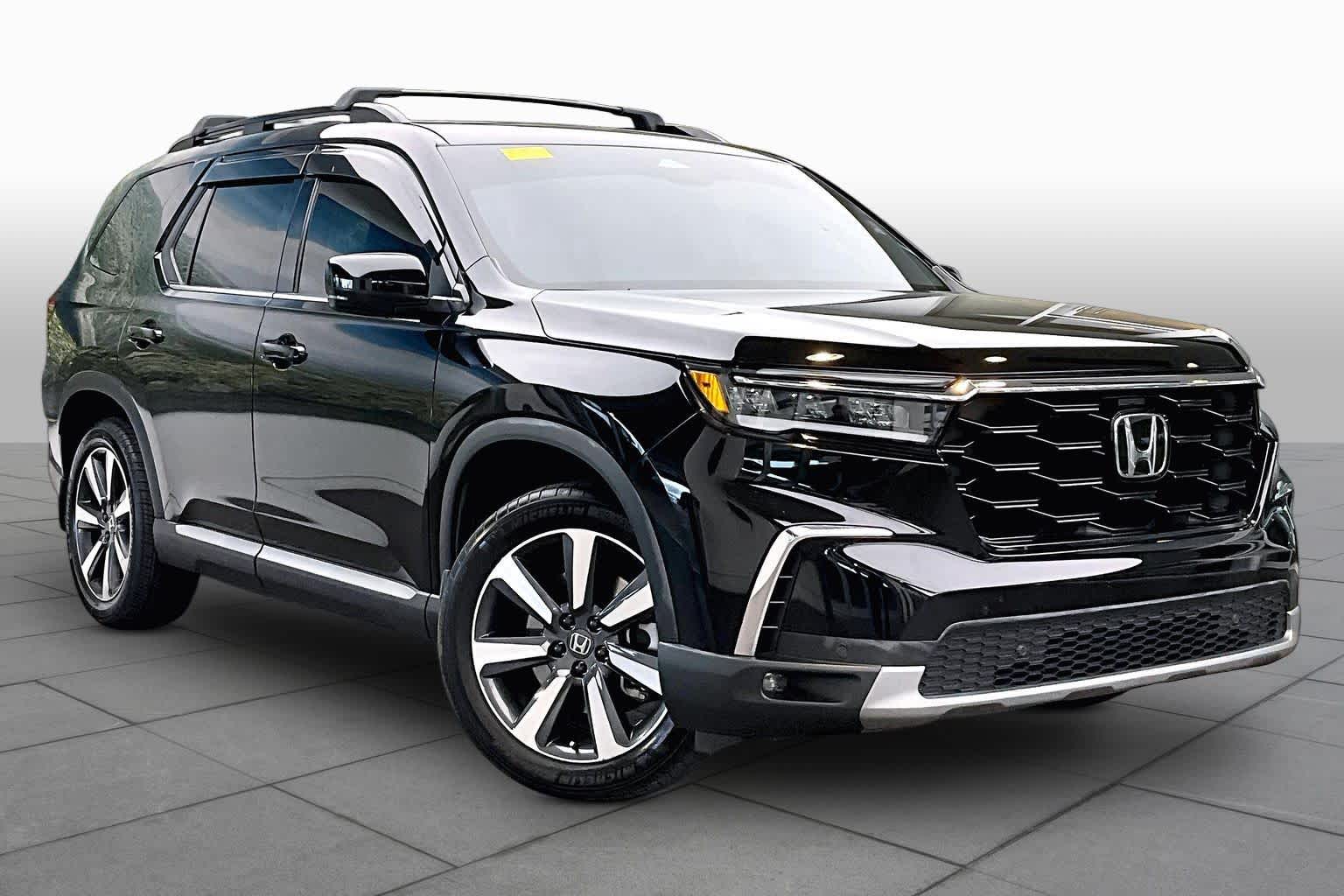 View vehicle photo 6