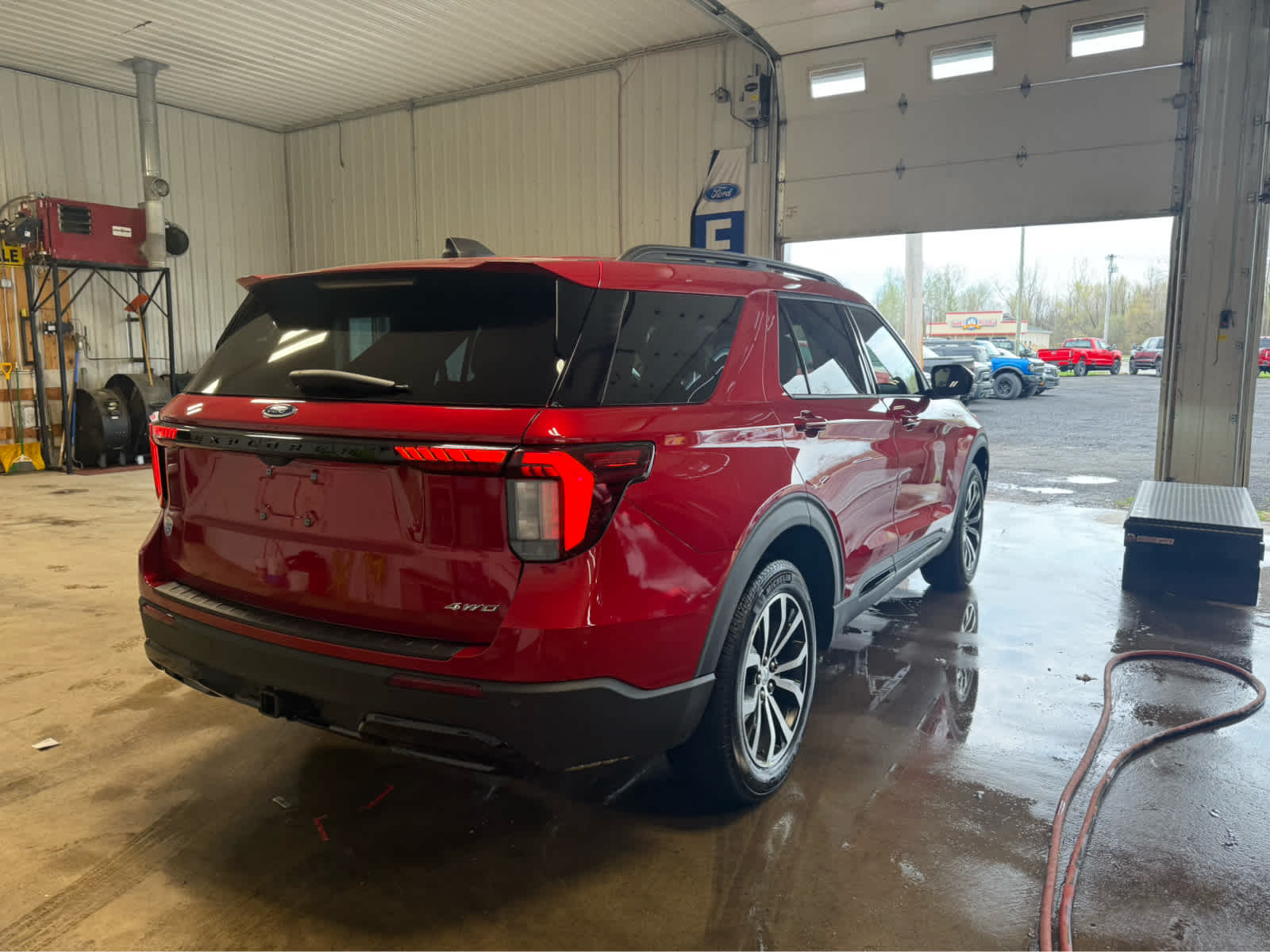 2026 Ford Explorer ST-Line - RAPID RED MET TINTED exterior view 5