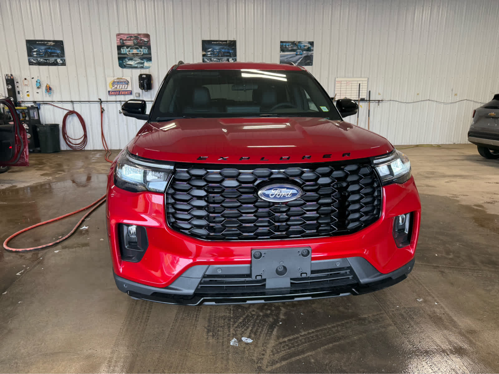 2026 Ford Explorer ST-Line - RAPID RED MET TINTED exterior view 3