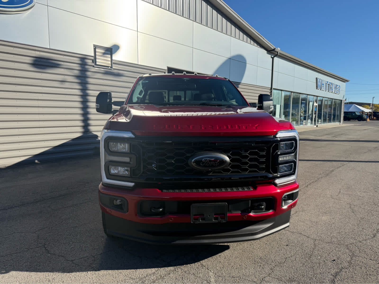 2026 Ford Super Duty F-350 SRW LARIAT - Ruby Red Metallic Tinted Clearcoat exterior view 3
