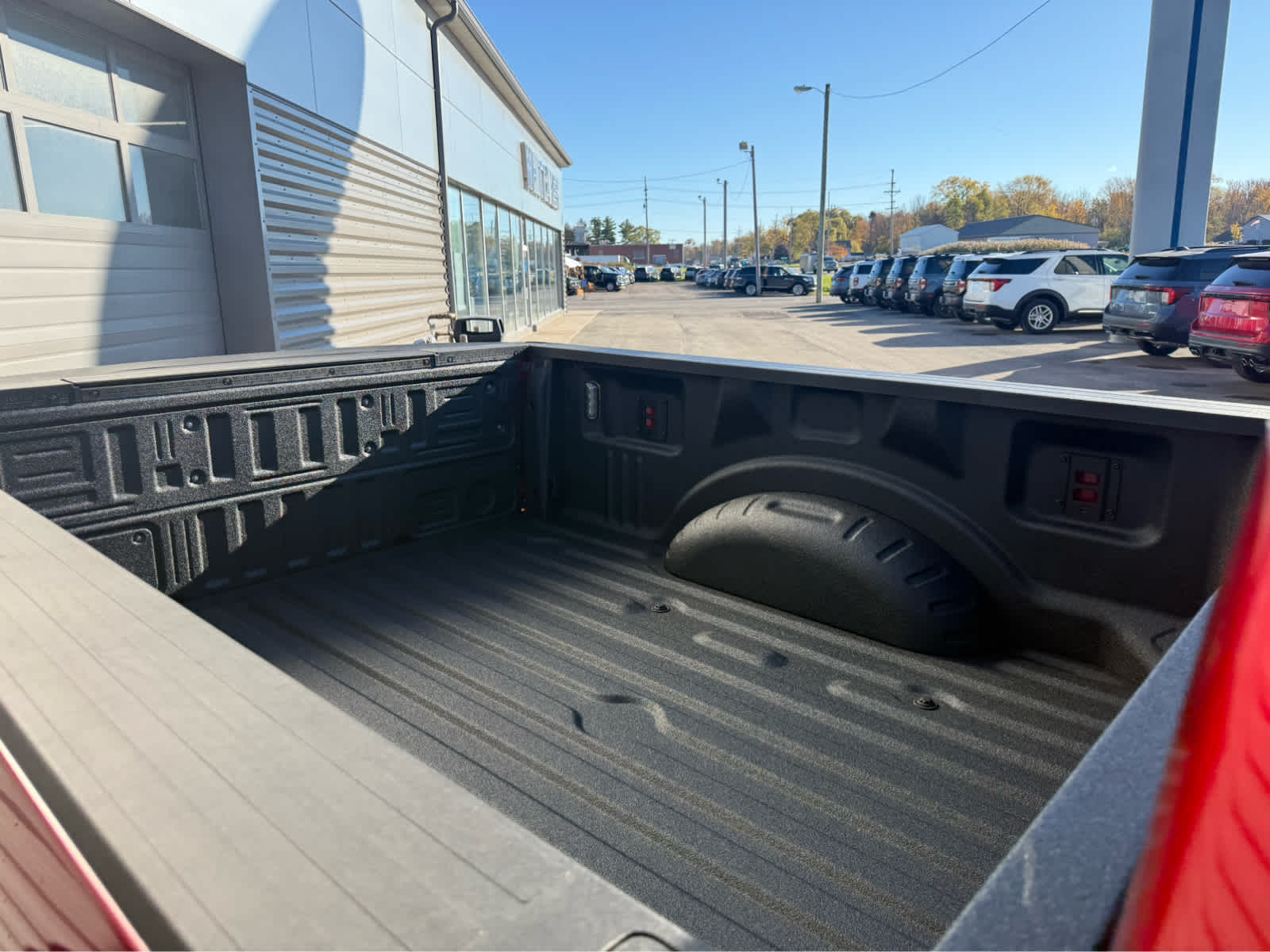 2026 Ford Super Duty F-350 SRW LARIAT - Ruby Red Metallic Tinted Clearcoat exterior view 6