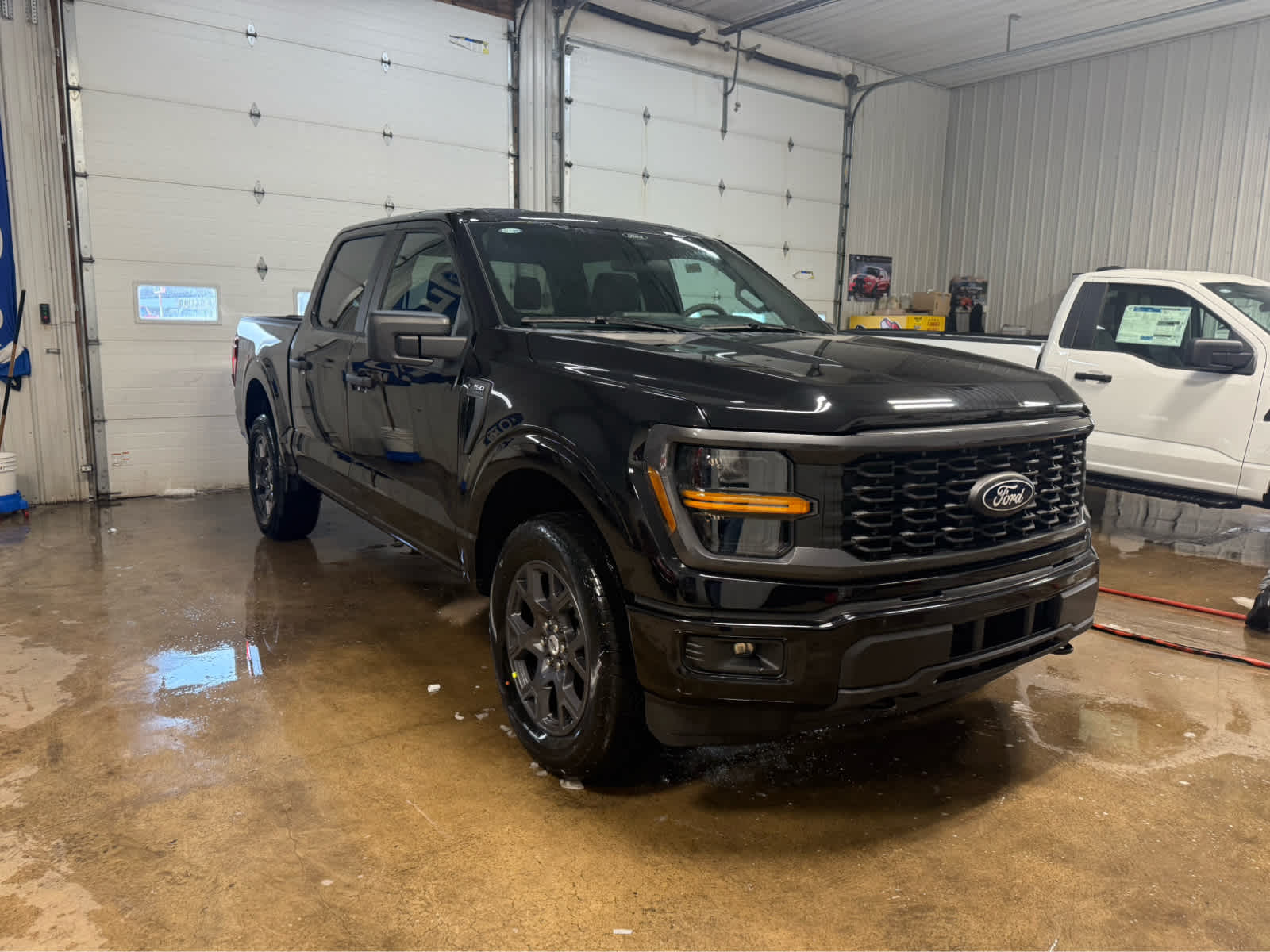 2026 Ford F-150 STX - Agate Black Metallic exterior view 2