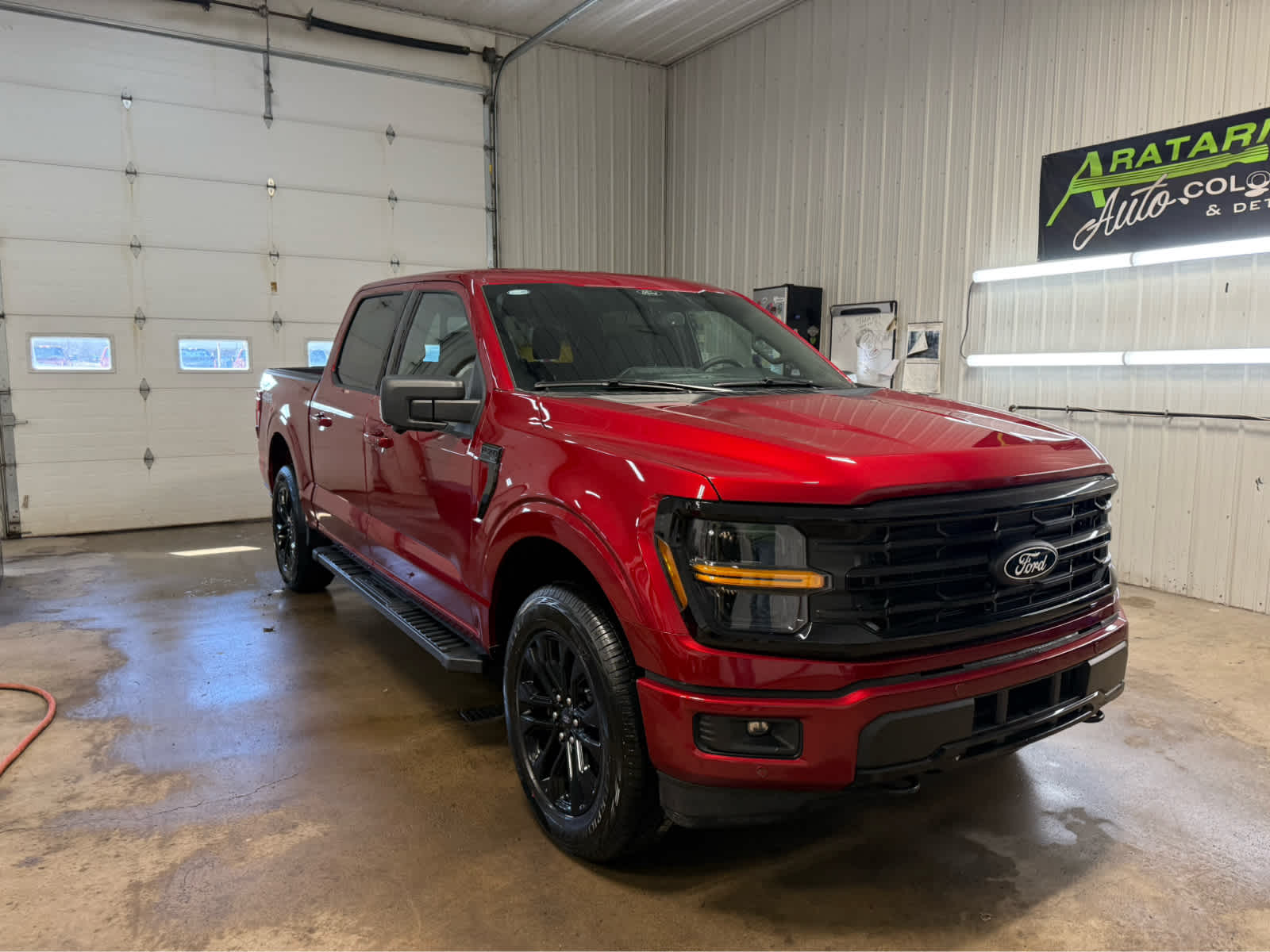 2026 Ford F-150 XLT - Ruby Red Metallic Tinted Clearcoat exterior view 2
