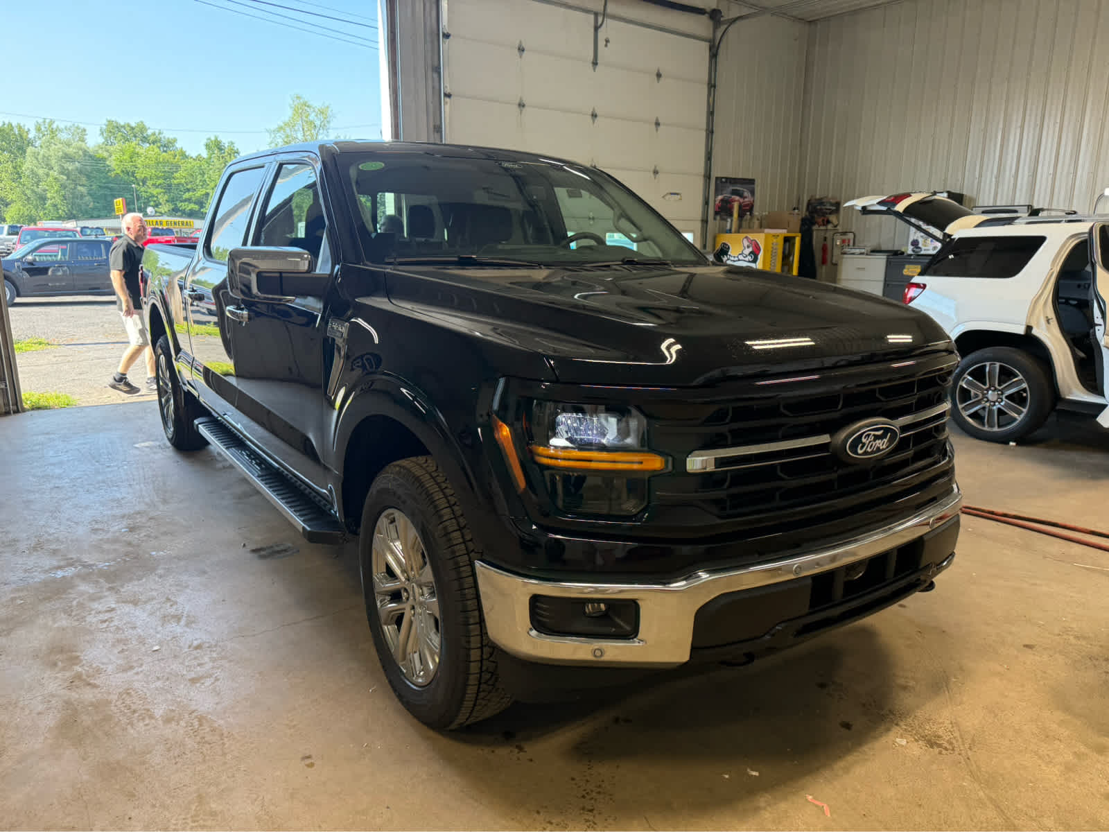 2026 Ford F-150 XLT - Agate Black Metallic exterior view 2