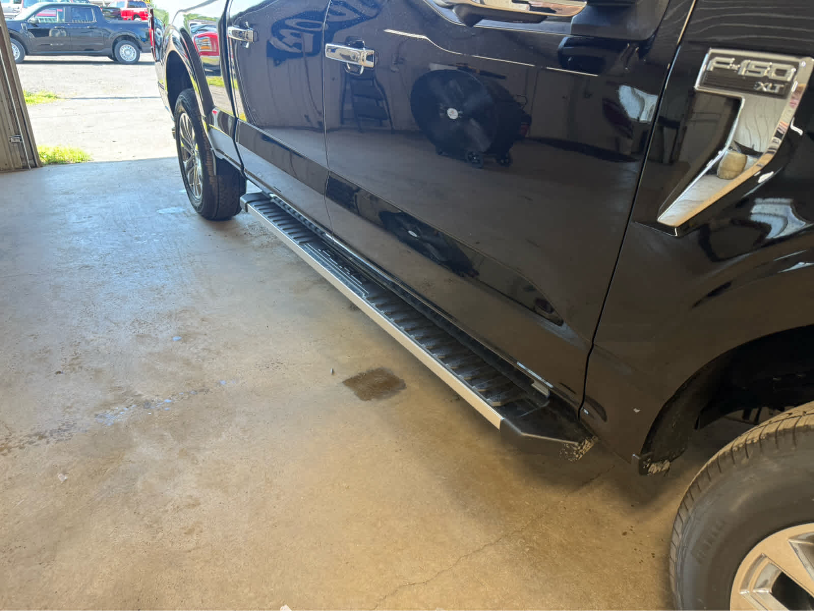 2026 Ford F-150 XLT - Agate Black Metallic exterior view 5