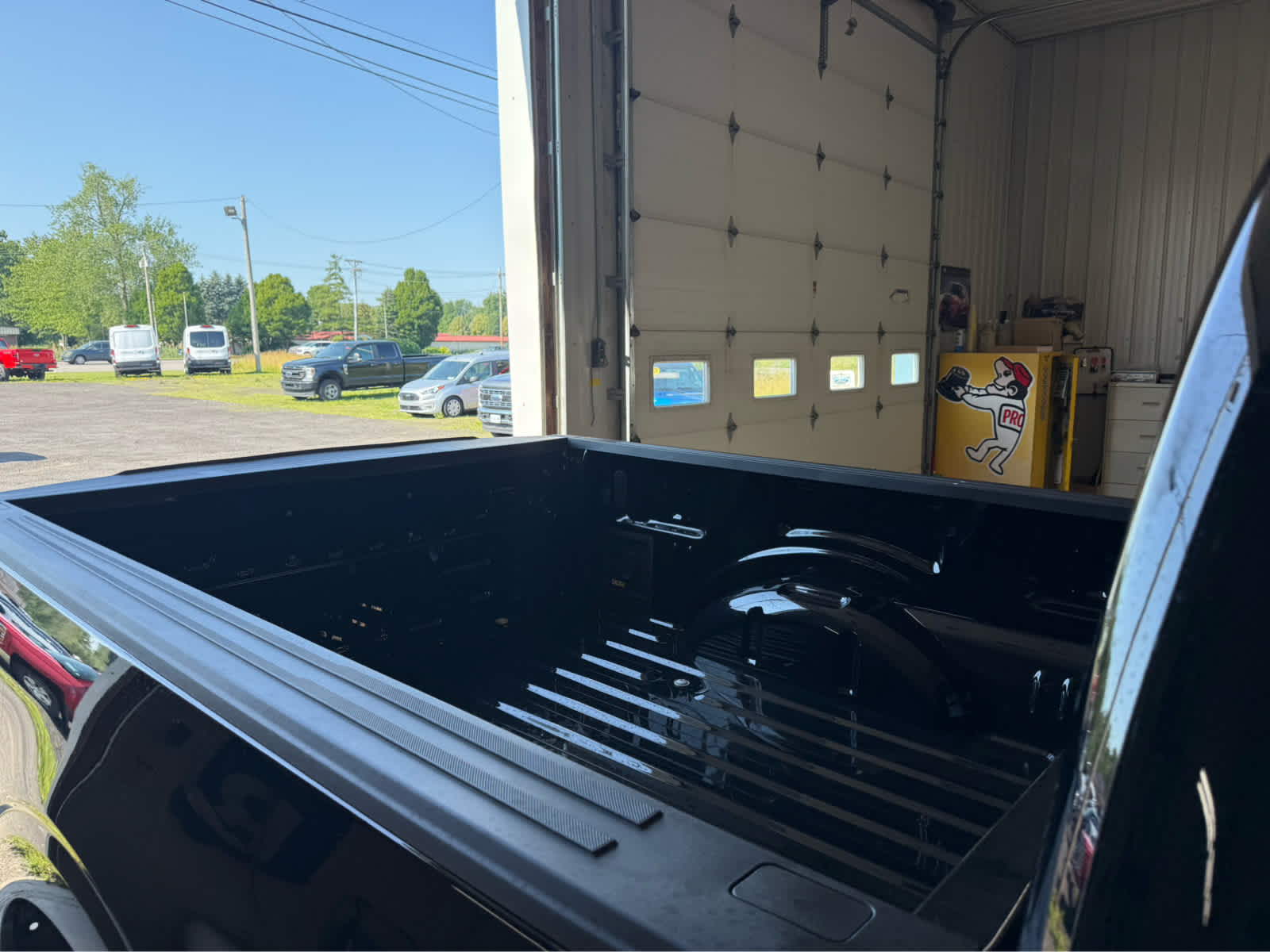 2026 Ford F-150 XLT - Agate Black Metallic exterior view 6