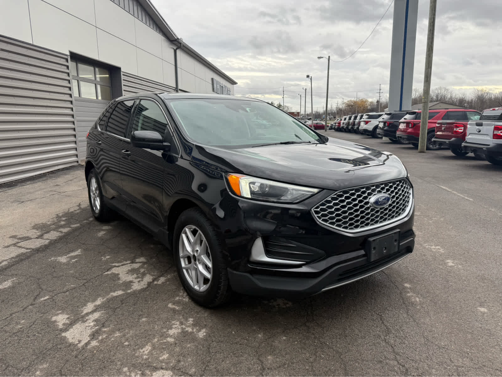 2024 Ford Edge SEL - Agate Black Metallic exterior view 2