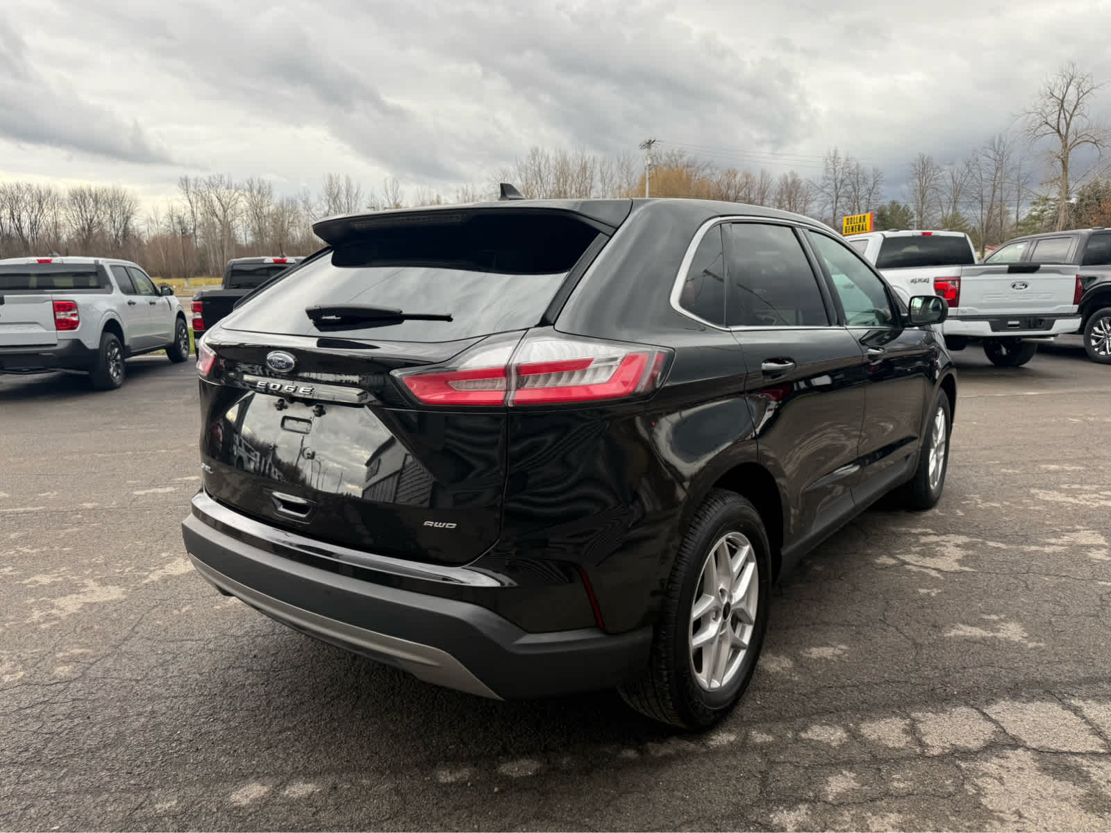 2024 Ford Edge SEL - Agate Black Metallic exterior view 5