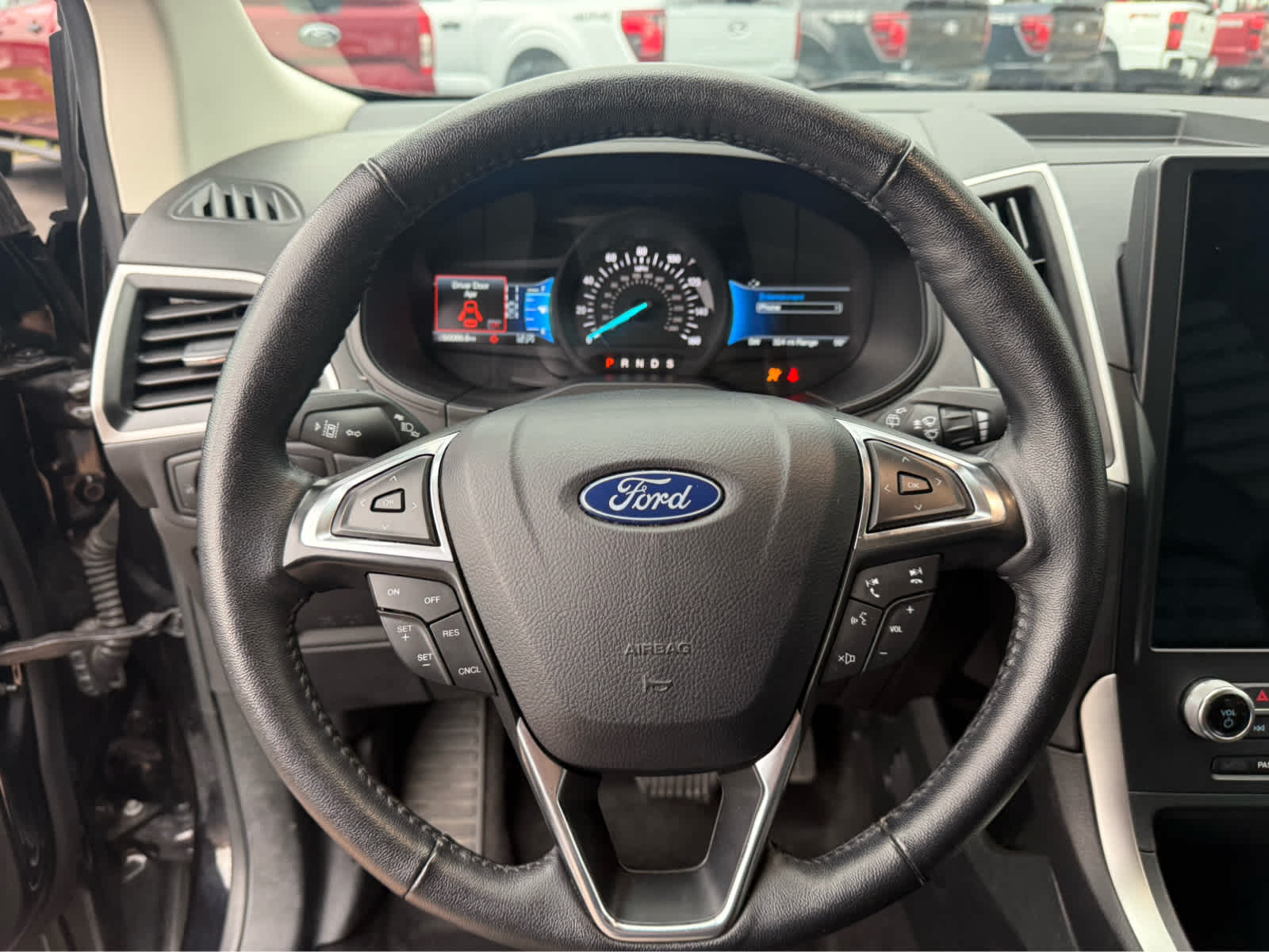 2024 Ford Edge SEL - Agate Black Metallic exterior view 9