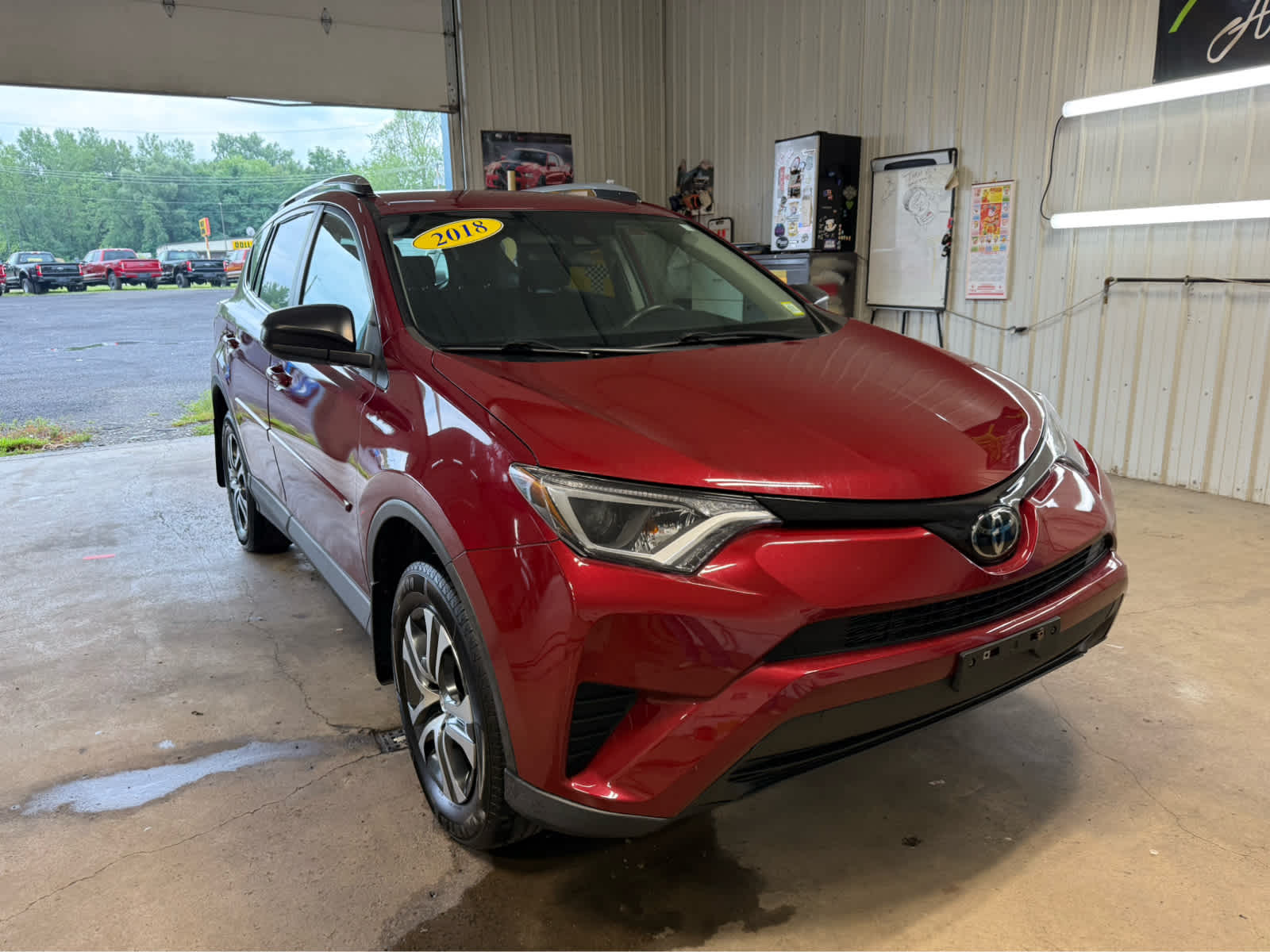 2018 Toyota RAV4 LE - Ruby Flare Pearl exterior view 2