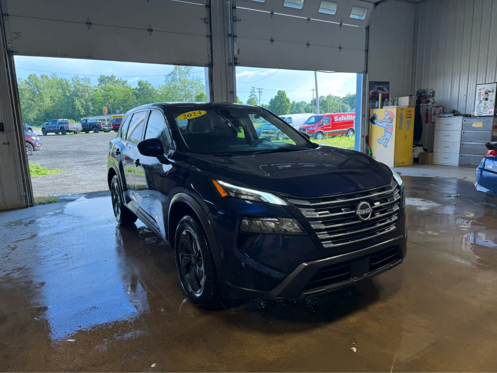2024 Nissan Rogue SV - Deep Ocean Blue Pearl exterior view 2