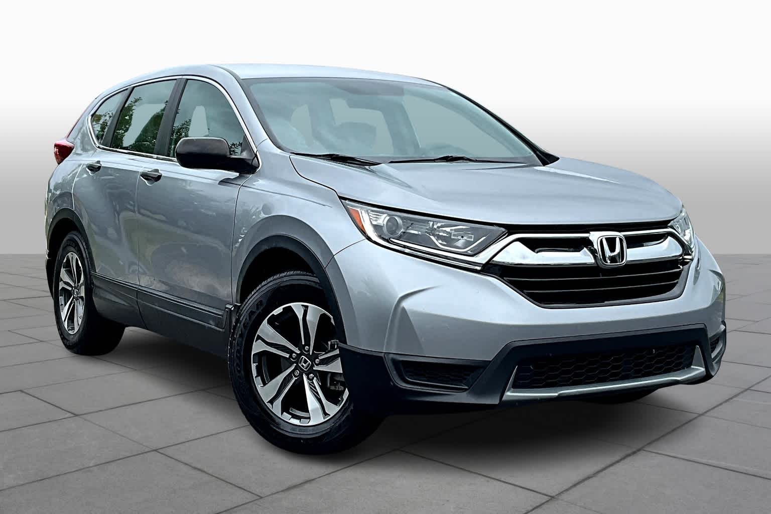 Used 2019 Honda CR-V LX with VIN 2HKRW5H39KH416894 for sale in Houston, TX