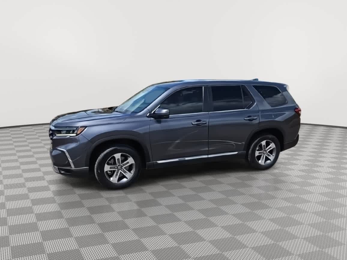 View vehicle photo 4