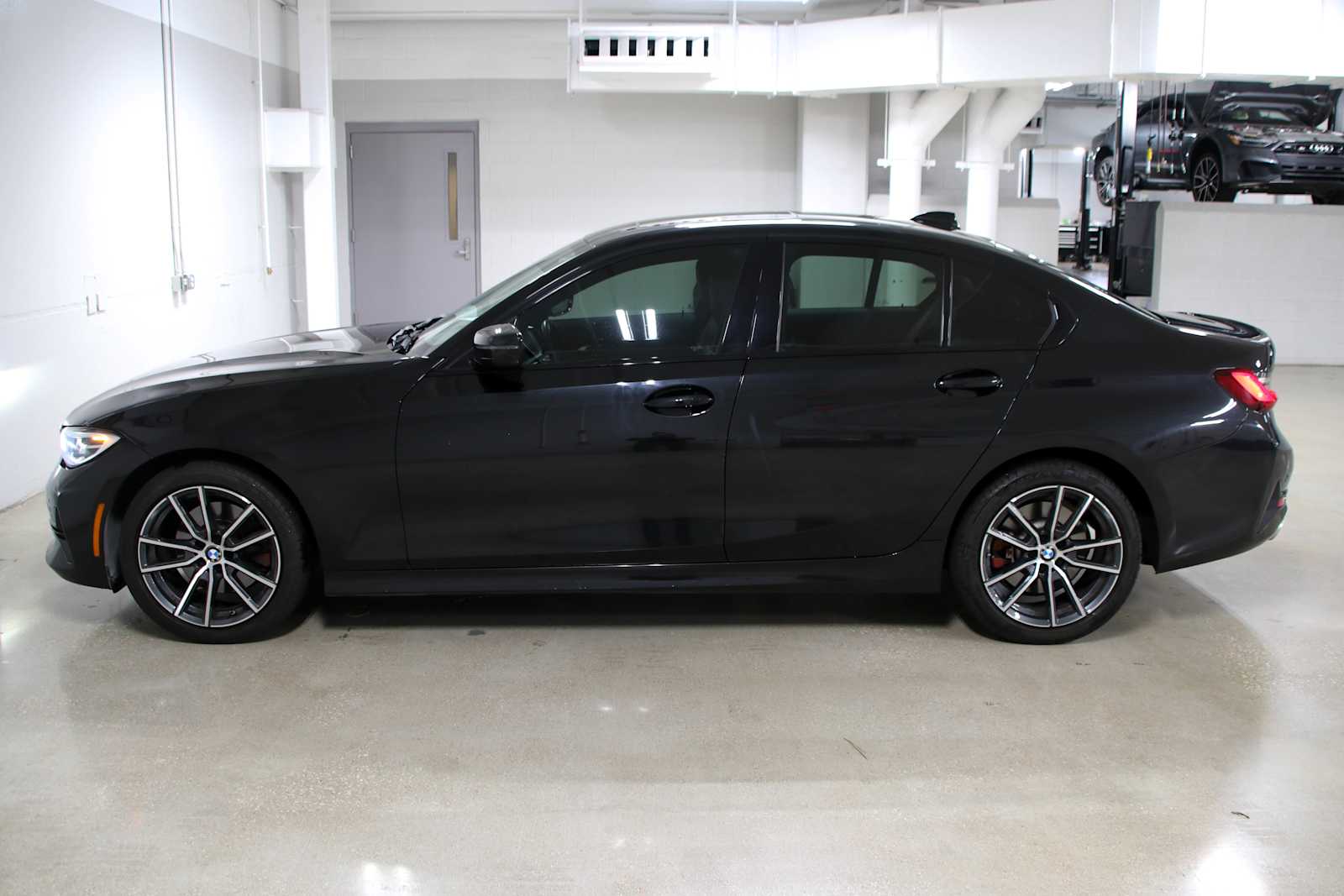 Used 2022 Black Sapphire Metallic BMW 330i image 2