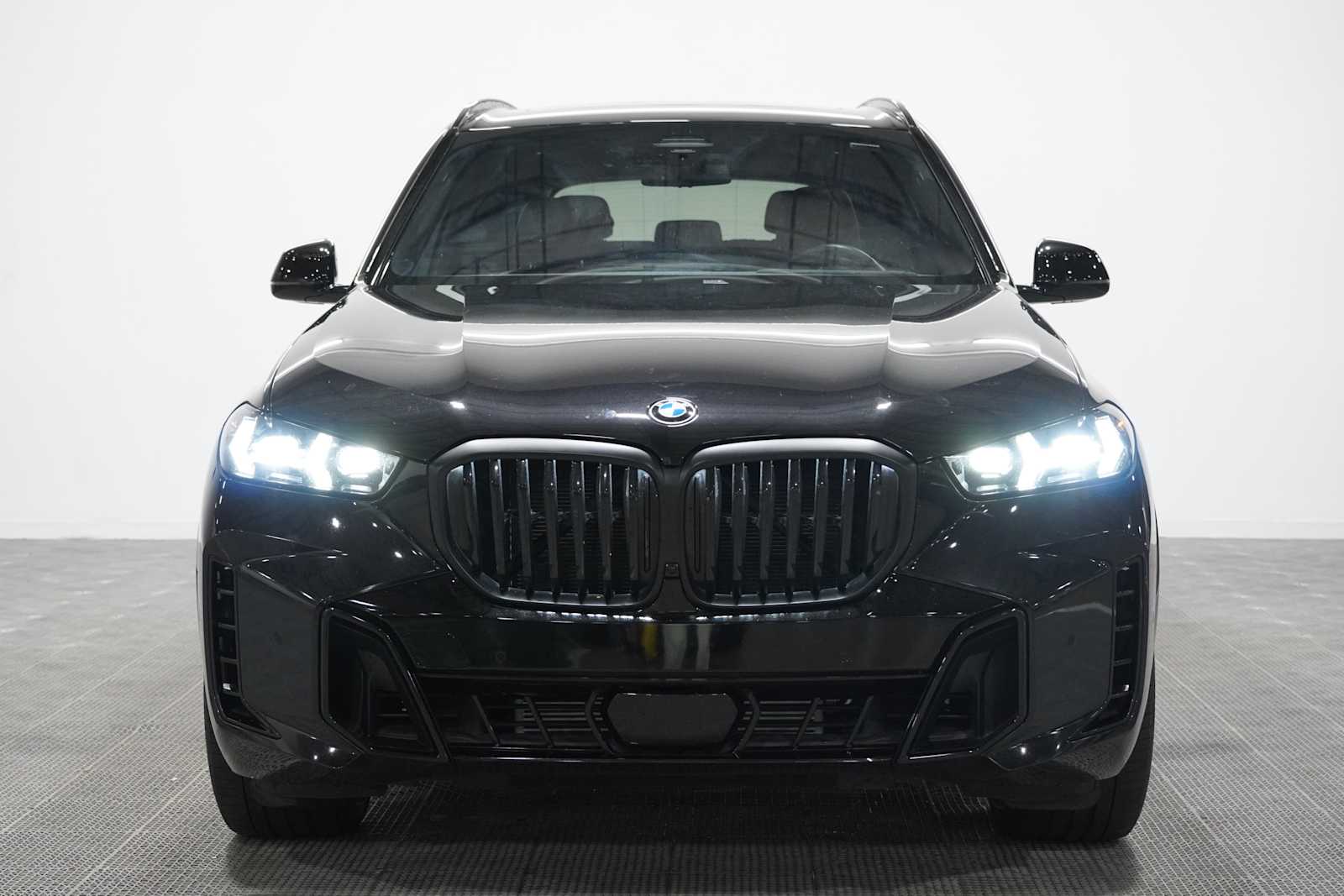 Certified Used 2024 Black Sapphire Metallic BMW sDrive40i image 2