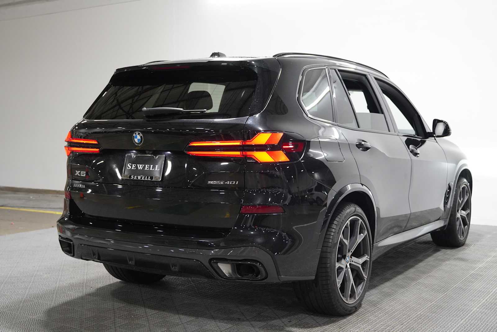 Certified Used 2024 Black Sapphire Metallic BMW sDrive40i image 4