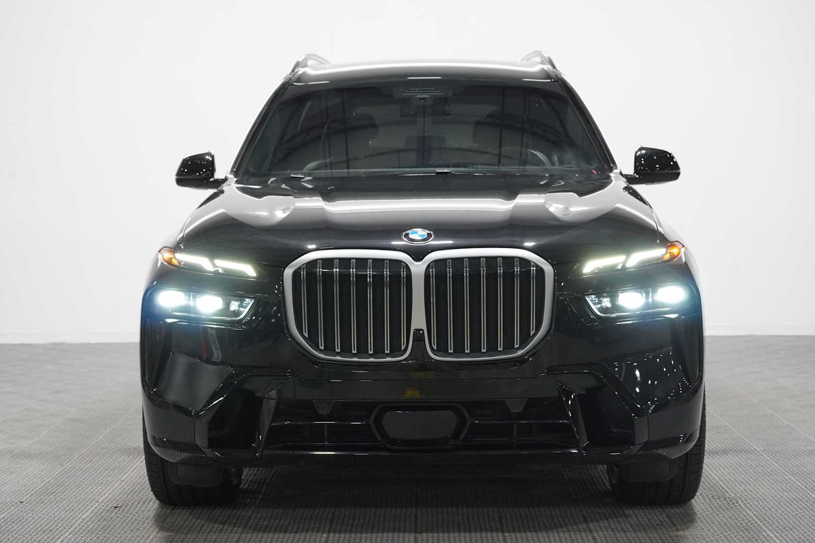 Certified Used 2025 Black Sapphire Metallic BMW xDrive40i image 2