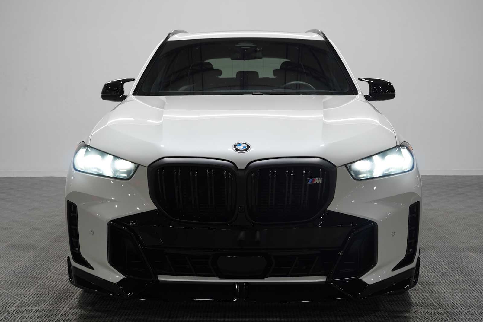 Used 2026 Mineral White Metallic BMW M60i image 2