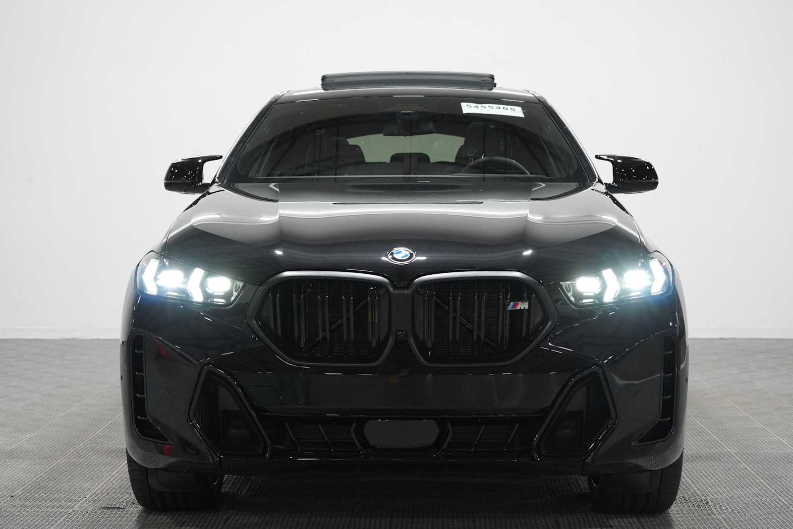 New 2027 Black Sapphire Metallic BMW M60i image 3