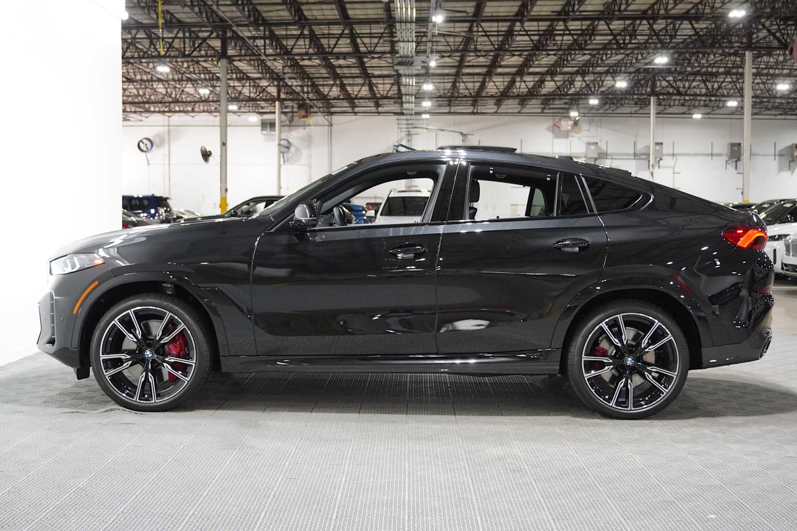 New 2027 Black Sapphire Metallic BMW M60i image 4