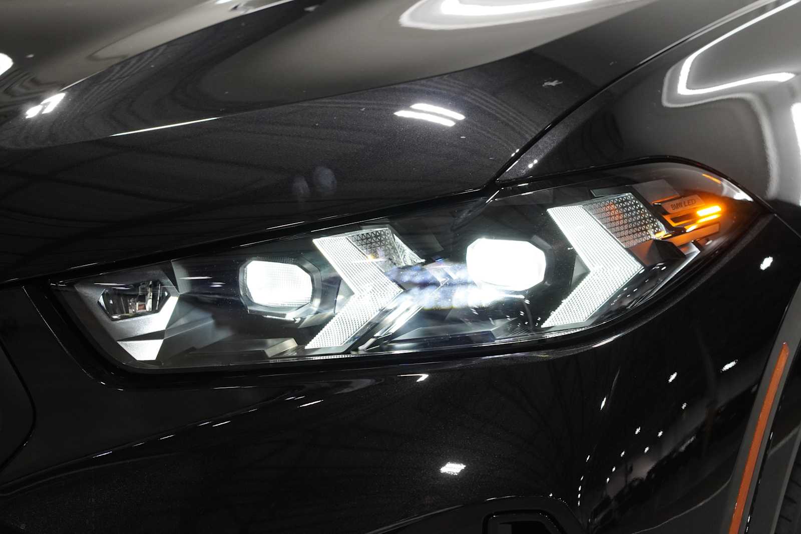 New 2027 Black Sapphire Metallic BMW M60i image 6
