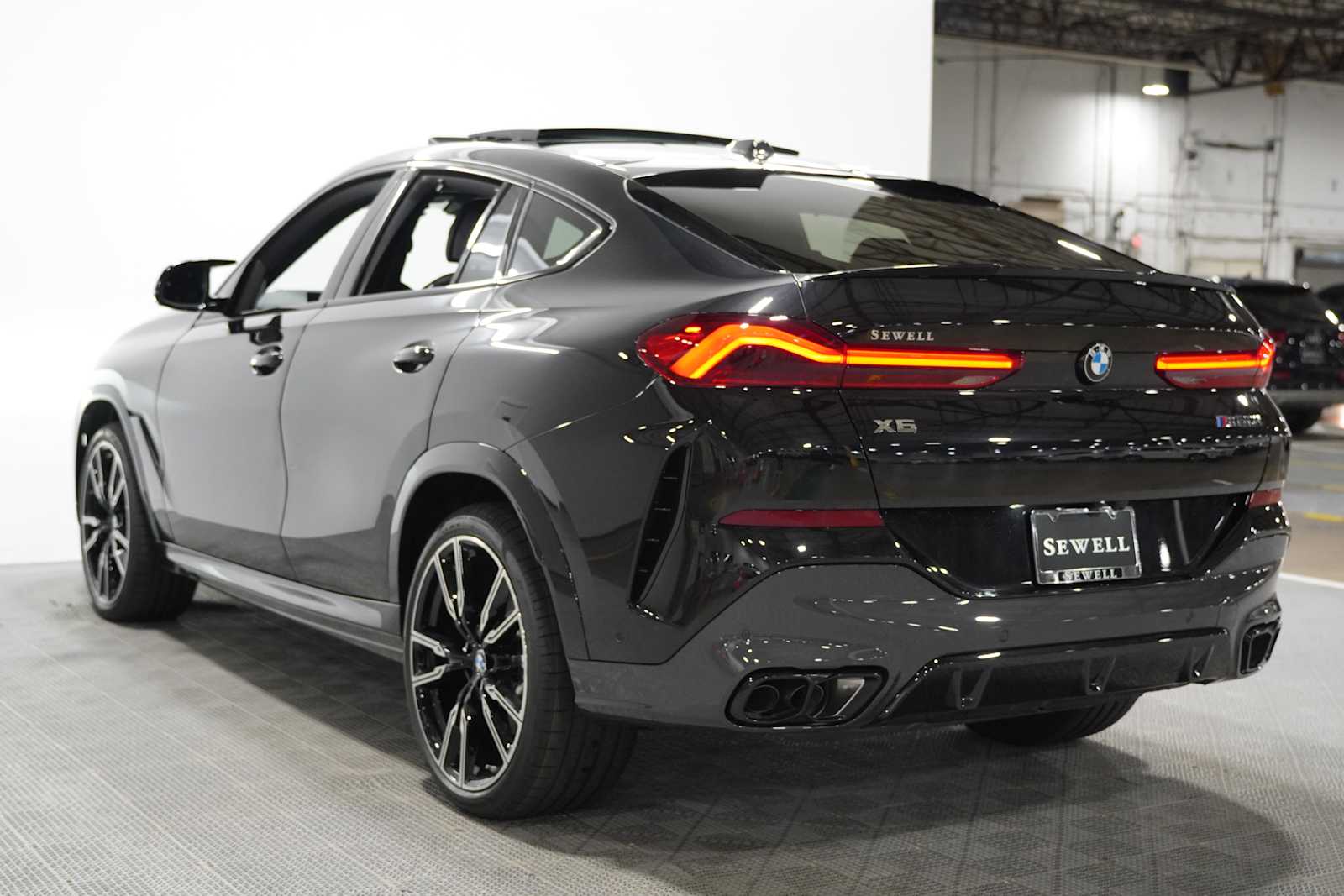 New 2027 Black Sapphire Metallic BMW M60i image 2