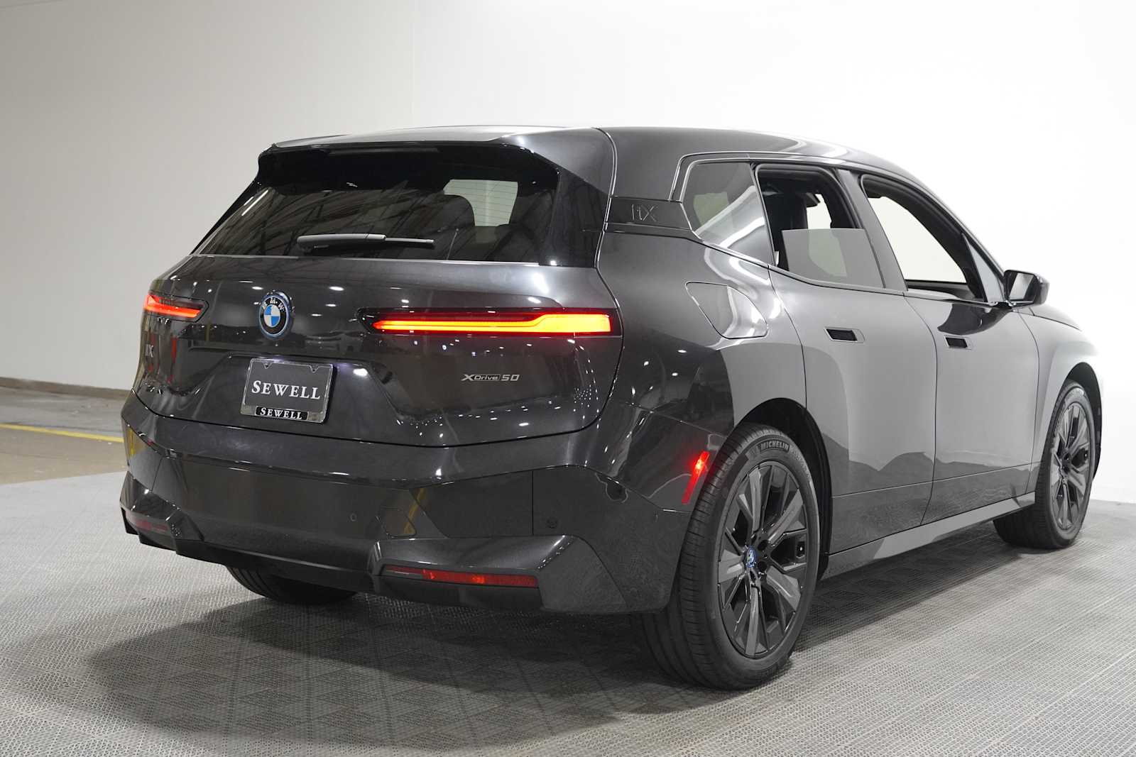 Certified Used 2023 Dark Graphite Metallic BMW xDrive50 image 4