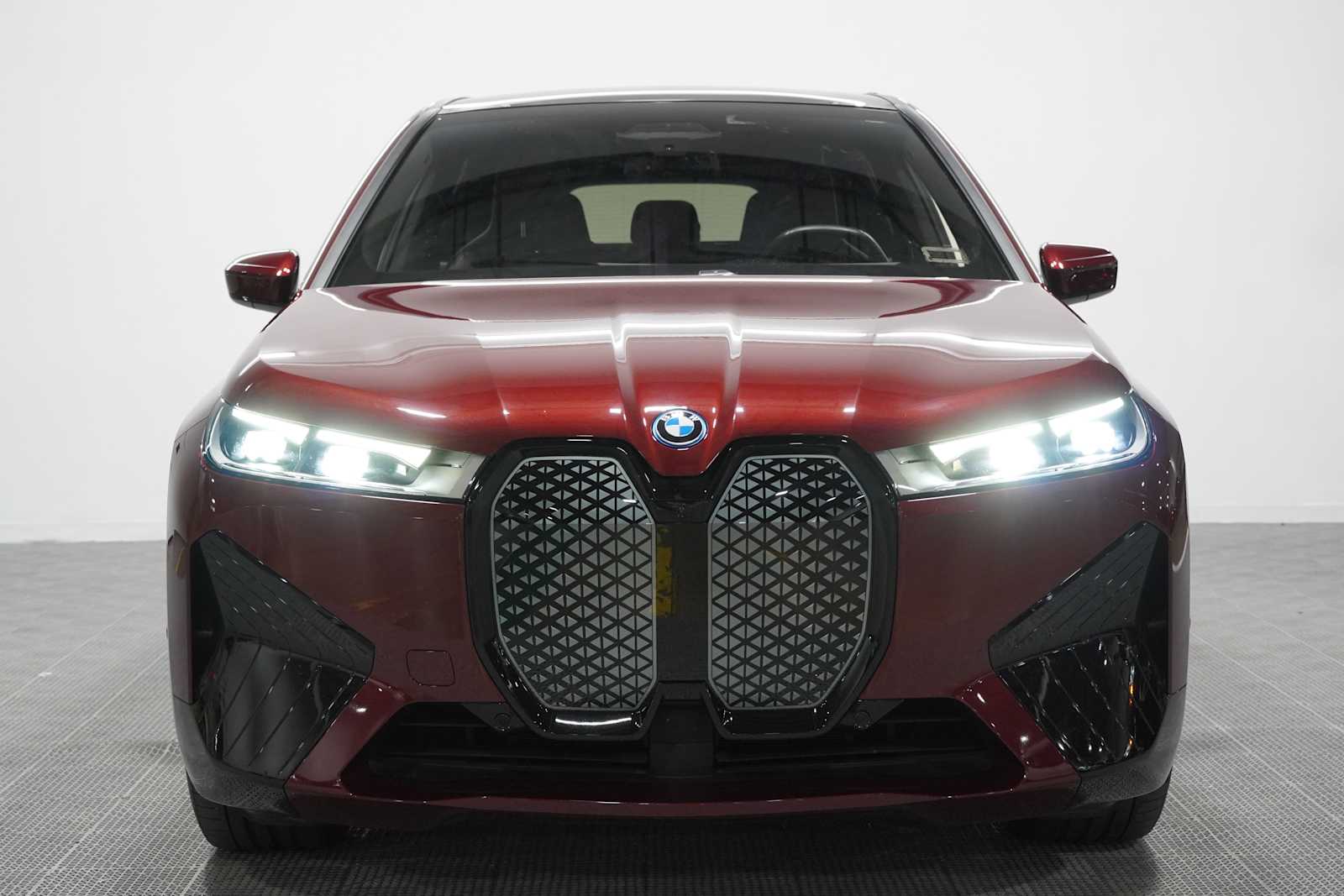Certified Used 2024 Aventurin Red Metallic BMW xDrive50 image 2