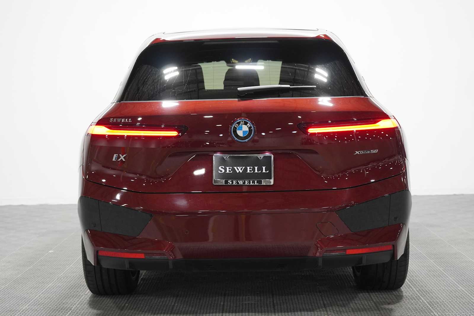 Certified Used 2024 Aventurin Red Metallic BMW xDrive50 image 6