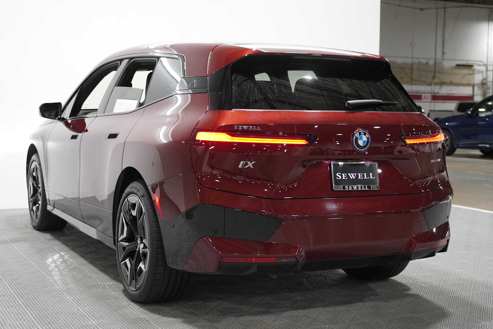 Certified Used 2024 Aventurin Red Metallic BMW xDrive50 image 7